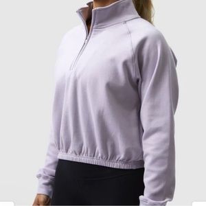 Born Primitive light lilac cropped sweatshirt.